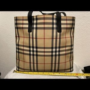 Burberry tote 11inch width and 10 inch height.